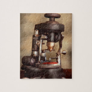 Puzzle Optométrie - Machine de découpe de lentilles