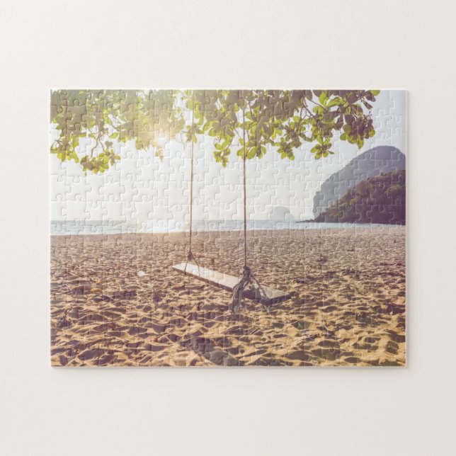 Puzzle Oscillation sur la plage au coucher du soleil (Horizontal)