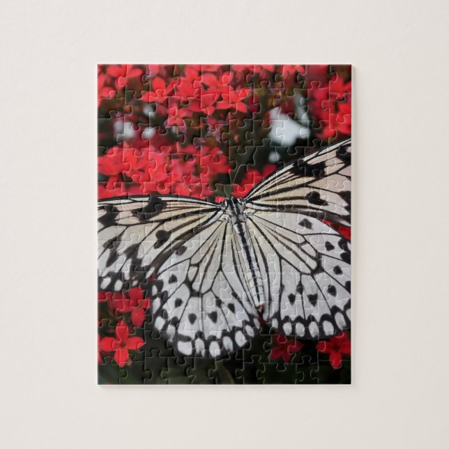 Puzzle Papillon noir et blanc sur Fleurs rouges (Vertical)