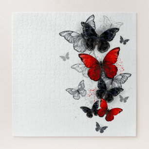 Puzzle Papillons noirs et rouges volants