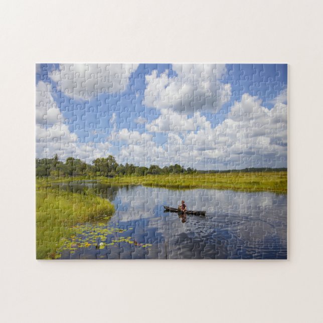Puzzle Pêcheur sur un lac au Guyana. (Horizontal)