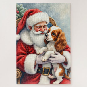 Puzzle Père Noël tenant un Cavalier King Charles Spaniel