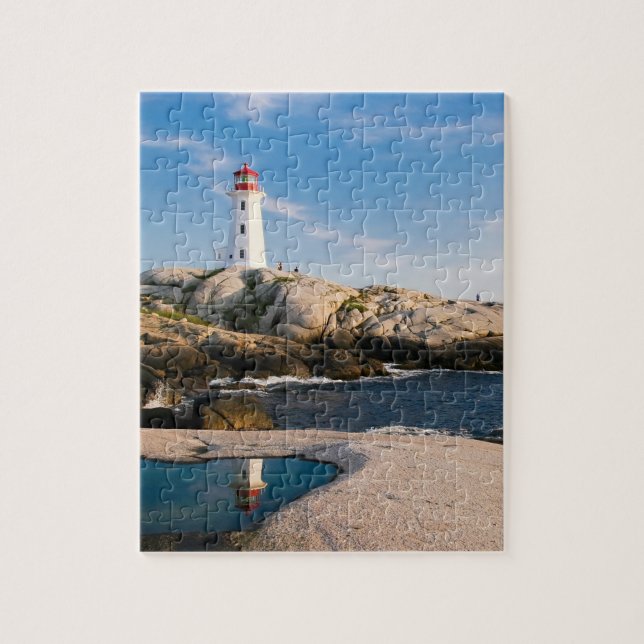 Puzzle Phare sur rochers avec réflexion océanique (Vertical)