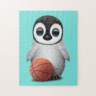 Puzzle Pingouin mignon de bébé jouant avec le basket-ball