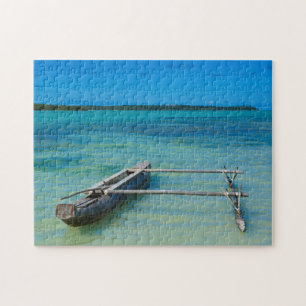 Puzzle Pirogue à balancier dans un océan peu profond