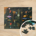 Puzzle Poisson magique | Paul Klee<br><div class="desc">Fish Magic (1925) de Paul Klee est un tableau abstrait captivant qui mêle des formes colorées et oniriques à un arrière - plan sombre et mystérieux. La pièce est composée de poissons stylisés et d'autres formes organiques qui semblent flotter dans un espace ombragé, créant un sentiment de mouvement et de...</div>
