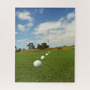 Puzzle Quatre Ballons De Golf Sur Le Vert,
