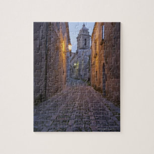Puzzle Ruelle obstruée de la vieille ville illuminée la n