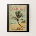 Puzzle Sanibel Island Palm Tree Vintage voyage<br><div class="desc">Un imprimé d'art moderne de Sanibel Island en Floride,  datant du milieu du siècle et d'un style rétro unique,  dans un style d'affiche de voyage vintage. Il dispose d'un palmier incurvé sur une plage de sable avec l'océan sous un ciel bleu nuageux.</div>