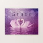 Puzzle Swans Grace Love  Purple Pink Personalized<br><div class="desc">Swans Grace Love Purple Pink Personalized jigsaw puzzle features a photograph of romantic swans meeting face to face on a lake with their graceful necks forming a heart shape as they come together face to face. The word Grace in text is above them. The photo filter makes the swans, water,...</div>