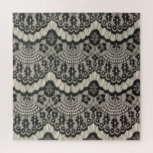 Puzzle Tissu dentelle ornement sur blanc.
