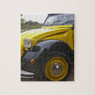 Puzzle Une vieille Citroen 2CV 2 CV noire et jaune,