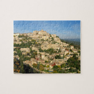 Puzzle Ville de la colline provinciale brille dans la lum