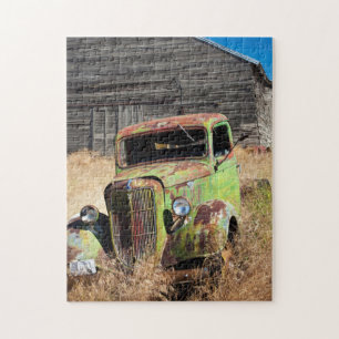 Puzzle Voiture rouillée devant une ferme abandonnée
