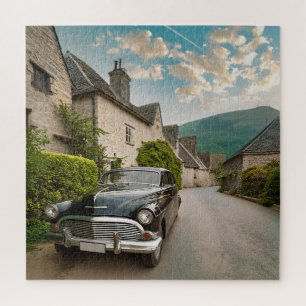 Puzzle Voiture vintage garée dans un village pittoresque