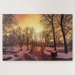 Puzzle Vue panoramique du parc enneigé au coucher du sole