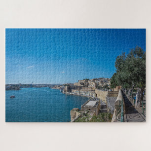 Puzzle Vue panoramique sur le mur de la ville et le port