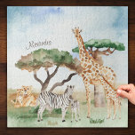 Puzzle Watercolor Mommy and Baby African Animals<br><div class="desc">Add an adorable custom safari theme to your game collection with this pretty watercolor African animal jigsaw puzzle. Puzzle has mommy and baby giraffes, zebras, and lions in an African savannah background. There is also a place for a first name (which may be removed per your preference). Makes a cute...</div>
