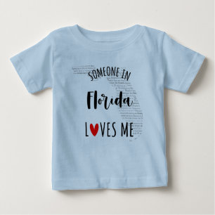 Quelqu'Un En Floride M'Aime Carte Baby T-shirt