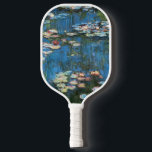 Raquette De Pickleball Nénuphars de Claude Monet, Impressionnisme Vintage<br><div class="desc">Nénuphar (1914) de Claude Monet est une peinture de nature impressionniste vintage. Une des nombreuses variations de peintures florales de nénuphars que Monet peint par l'étang dans son jardin fleuri à Giverny, France. À propos de l'artiste : Claude Monet (1840-1926) est un fondateur du mouvement de peinture impressionniste française, dont...</div>