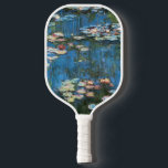 Raquette De Pickleball Nénuphars de Claude Monet, Impressionnisme Vintage<br><div class="desc">Nénuphar (1914) de Claude Monet est une peinture de nature impressionniste vintage. Une des nombreuses variations de peintures florales de nénuphars que Monet peint par l'étang dans son jardin fleuri à Giverny, France. À propos de l'artiste : Claude Monet (1840-1926) est un fondateur du mouvement de peinture impressionniste française, dont...</div>