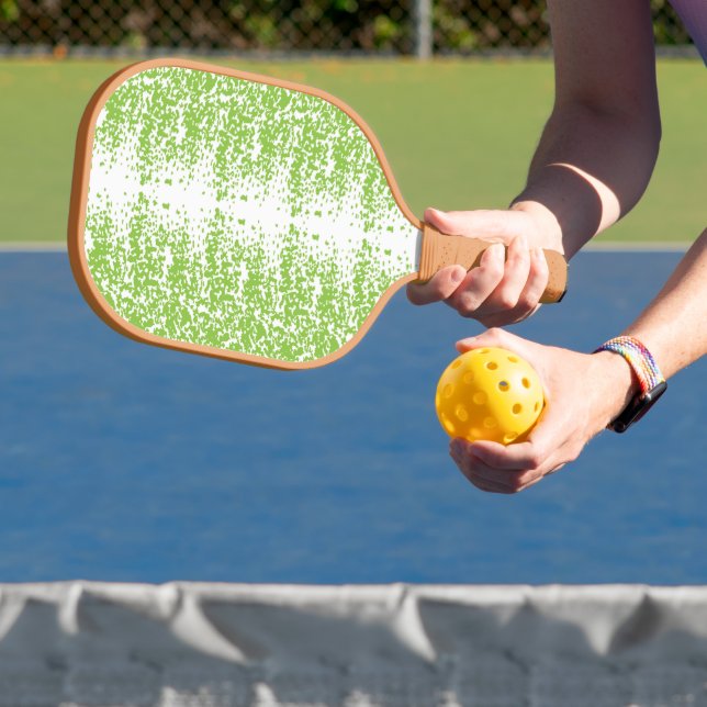 Raquette De Pickleball un arrière - plan vert et blanc avec des petits po (Insitu)