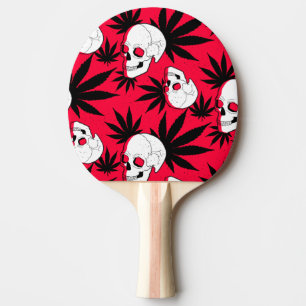 Raquette De Ping Pong Feuille de plante herbacée et crânes sur fond roug