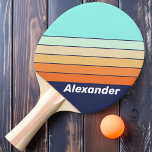 Raquette De Ping Pong Style vintage Retro Sport rayé avec le nom<br><div class="desc">Ajoutez une touche personnalisée à votre jeu grâce à la pagaie de ping-pong Vintage Style Retro Sport à rayures, dotée d'un design rayé audacieux et classique et de l'option de customiser avec votre nom. Cette pagaie apporte un mélange unique de nostalgie et d'individualité à chaque service et rassemblement, ce qui...</div>