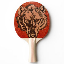 Tête de loup sur la pagaie de ping-pong rouge