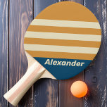 Raquette De Ping Pong Vintage Sport Blue Wave Stripes avec nom<br><div class="desc">La pagaie de ping-pong Vintage Sport Blue Wave Stripes présente un design dynamique et audacieux qui saisit l'essence du mouvement et de l'énergie. Avec ses rayures vibrantes à la vague, cette pagaie dégage une sensation de fluidité et de style, ce qui en fait un complément captivant à votre jeu. L'esthétique...</div>