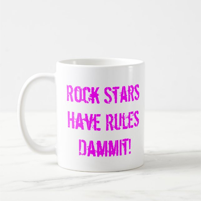 Règles de tasse de vedettes du rock (Gauche)