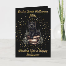 Chat d'Halloween avec carte d'étoiles et de livres