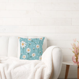 Ressort floral des fleurs blanches avec coussin bl