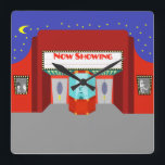 Rétro cinéma Théâtre Acrylique Mur Horloge<br><div class="desc">Les étoiles sont en pleine force sur cette horloge murale acrylique du cinéma rétro - à la fois les étoiles dans le ciel nocturne et les étoiles sur l'écran d'argent. Ce style des années 1960, minimaliste, présente l'extérieur d'une maison de cinéma classique de l'âge d'or du cinéma. Le bâtiment rouge...</div>