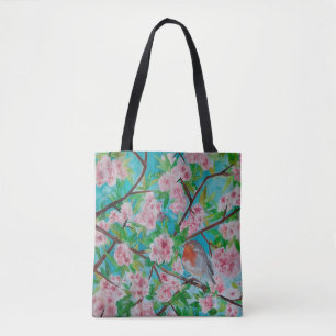 Robin en fleurs de cerisiers sur un sac