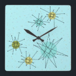 Robin's Oeuf Bleu étoile atomique Horloge murale<br><div class="desc">Ce Robin's Egg Blue Iconic Atomic Starbursts Carré Acrylique Mur Clock motif comporte des étoiles atomiques emblématiques. C'est vrai ! L’ancienne école, arrière - plan de couleur bleu oeuf de robin avec des taches d’or, est la toile de fond idéale pour les cercles turquoise, apaisants et vert poire kitsch. Les...</div>