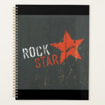 Rock Star Distressed Grunge Red Star<br><div class="desc">Organize your gigs, rehearsals, and daily tasks in this rock star vintage grunge spiral planner. The cover displays a heavily distressed red star and retro typography, offering a cool and professional look for musicians and creative thinkers. Inside, you will find plenty of space to track your schedule, set goals, and...</div>