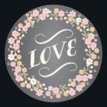 Rond Charming Garden Floral Wreath Mariage Love Sticker<br><div class="desc">Ce joli design de couronne de fleurs en rose tendre, abricot et ivoire encercle le design de typographie "Love" charmant sur cet autocollant de faveur de mariage mis sur un arrière - plan populaire de tableau noir. Élégant mais décontracté, il est un accessoire parfait pour tout mariage de printemps ou...</div>
