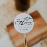 Rond Romantic Calligraphy Names Save the Date Sticker<br><div class="desc">This romantic calligraphy names save the date sticker is perfect for a simple wedding. The modern classic design features fancy swirls and whimsical flourishes with gorgeous elegant hand lettered typography. Personalize the stickers with your names and wedding date.</div>