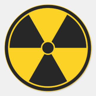 Rond Sticker du symbole de rayonnement jaune de prudenc