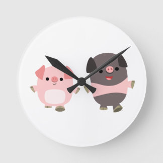 Ronde De mignons cochons en dessin sur une horloge mural