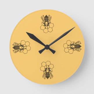 Ronde Horloge - abeille de miel sur le peigne