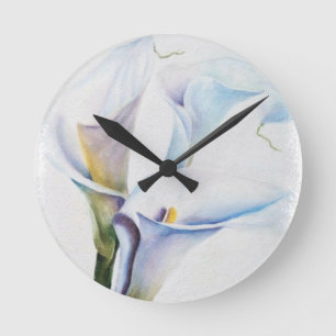 RONDE HORLOGE BLANCHE DE TROIS ZANTEDESCHIAS