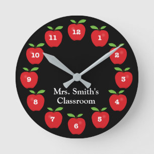 Ronde Horloge de classe avec pommes en noir