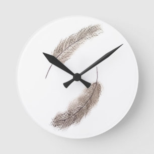 Ronde horloge de plume