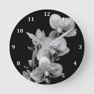 Ronde Horloge en noir et blanc avec orchidées