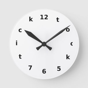 Ronde une horloge amusante à visage tic tac