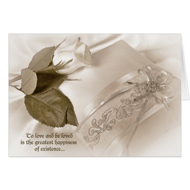 rose blanche sur coussin mariage (Devant horizontal)