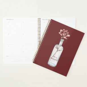 Rose rouge en bouteille