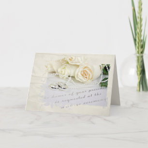 Roses mariages et anneaux sur invitation